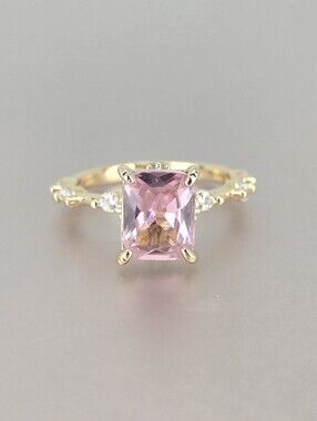 Gold Ring with Pink Radiant-Cut Gemstone and Accent Stones